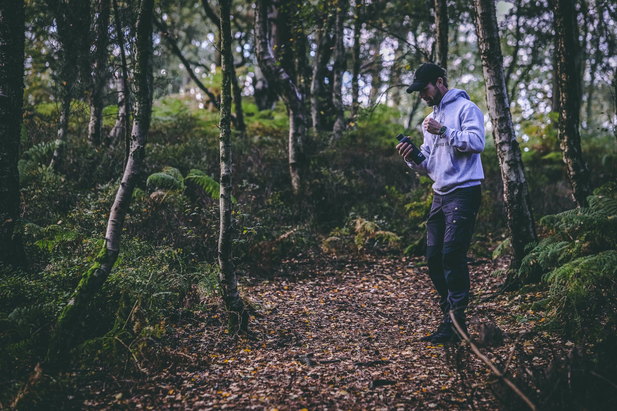 steaming coffee in the woods