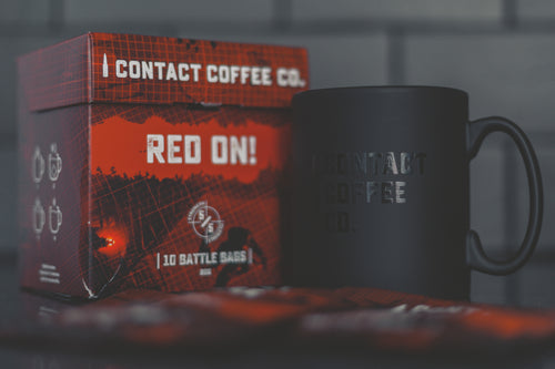 coffee bags and black coffee mug