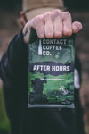  man holding bag of contact coffee after hours