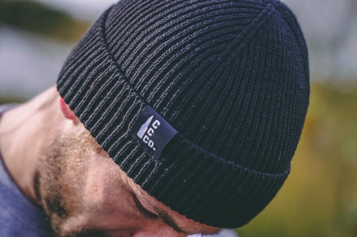 man wearing black beanie