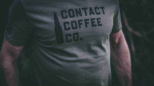 man wearing contact coffee co military green t-shirt