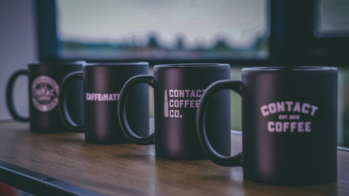 four contact coffee co black military mugs