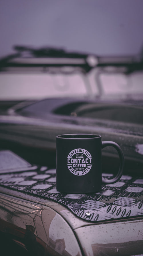 black matte mug on the bonet of a land rover defender