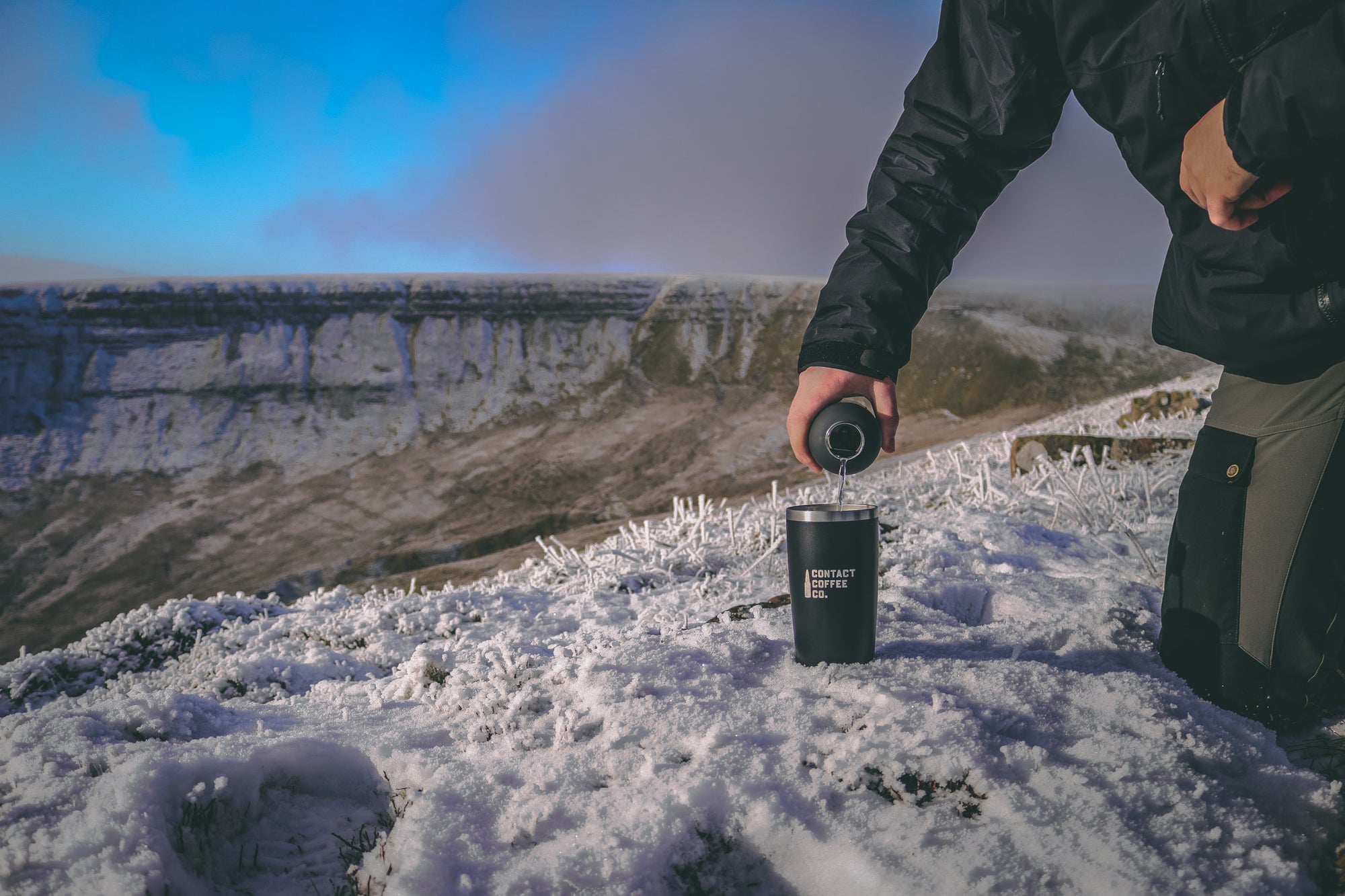 making coffee on a mountain in the snow