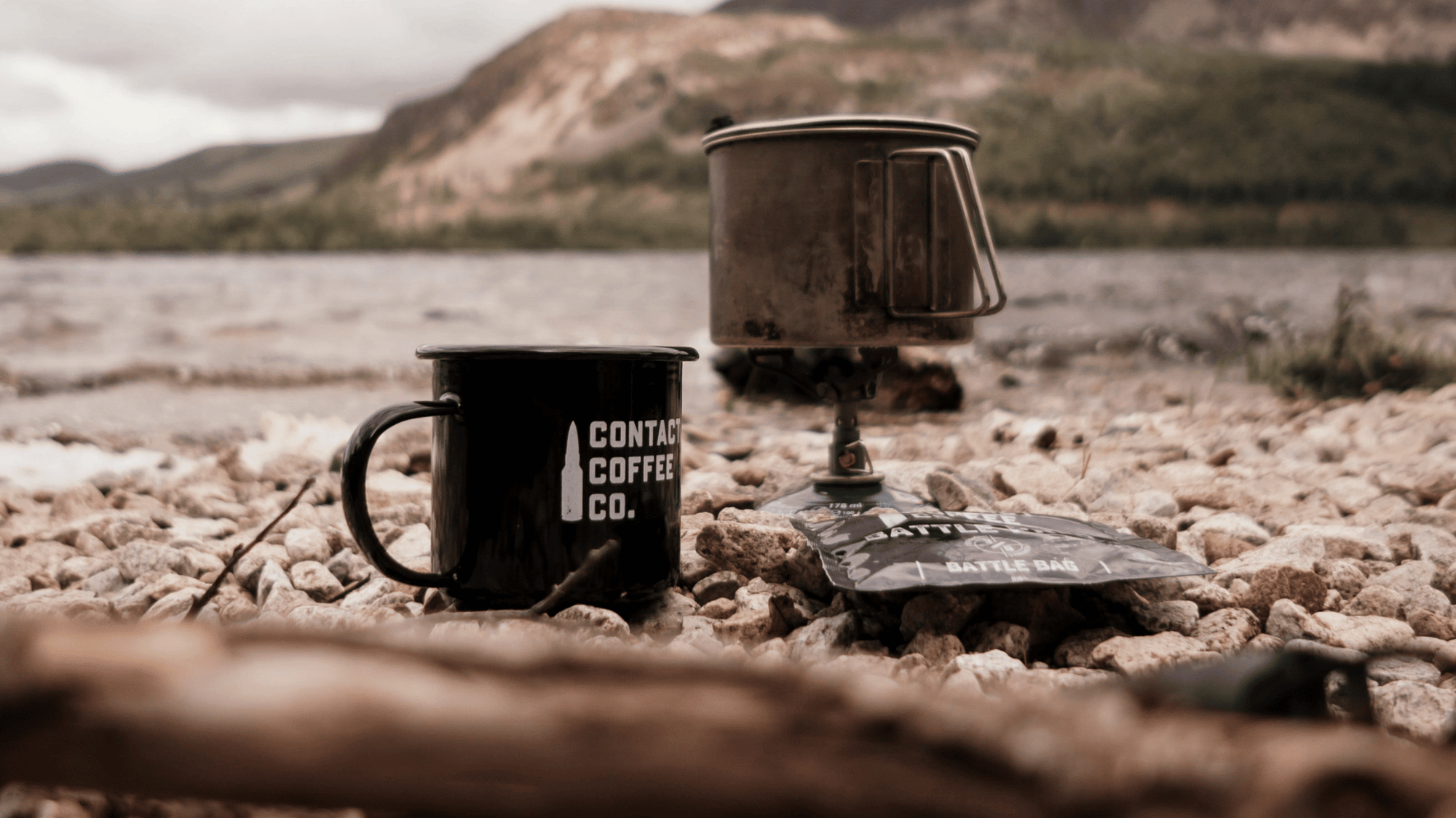 coffee kit next to a mountain