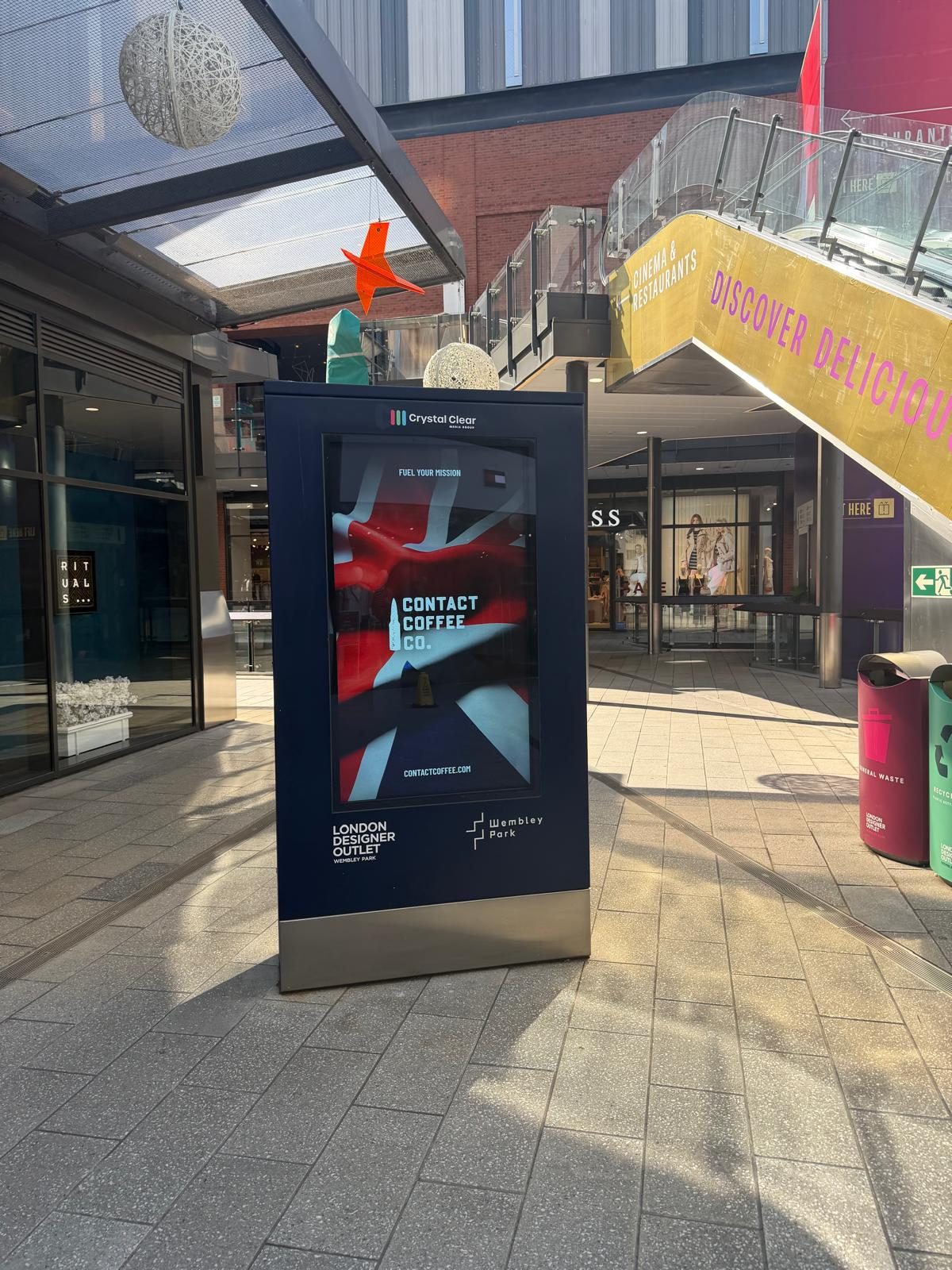 Contact Coffee Union Jack campaign screen at Wembley Park's London Designer Outlet