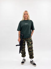 Load image into Gallery viewer, Female 10 Green Small Contact logo shirt Front
