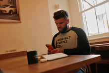 Load image into Gallery viewer, Contact Coffee Baseball Long Sleeve, Heather Grey / Black - worn in cafe
