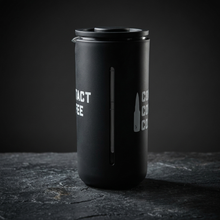 Load image into Gallery viewer, Travel coffee maker side view, glass carafe and black lid inside the protective casing

